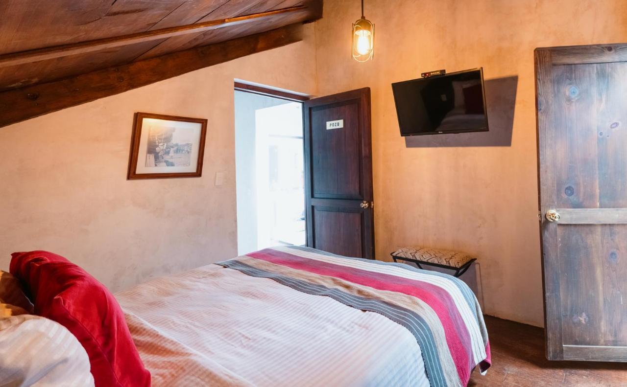 Yox Hotel Boutique San Cristóbal de Las Casas Kültér fotó A room at the hotel